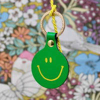 Feeling Lush Smilie Face Key Fob - Coral