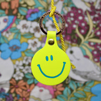 Feeling Lush Smilie Face Key Fob - Coral
