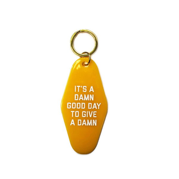 It's A Damn Good Day To Give A Damn Motel Keychain