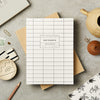 Vol 18 Ivory Grid Notebook